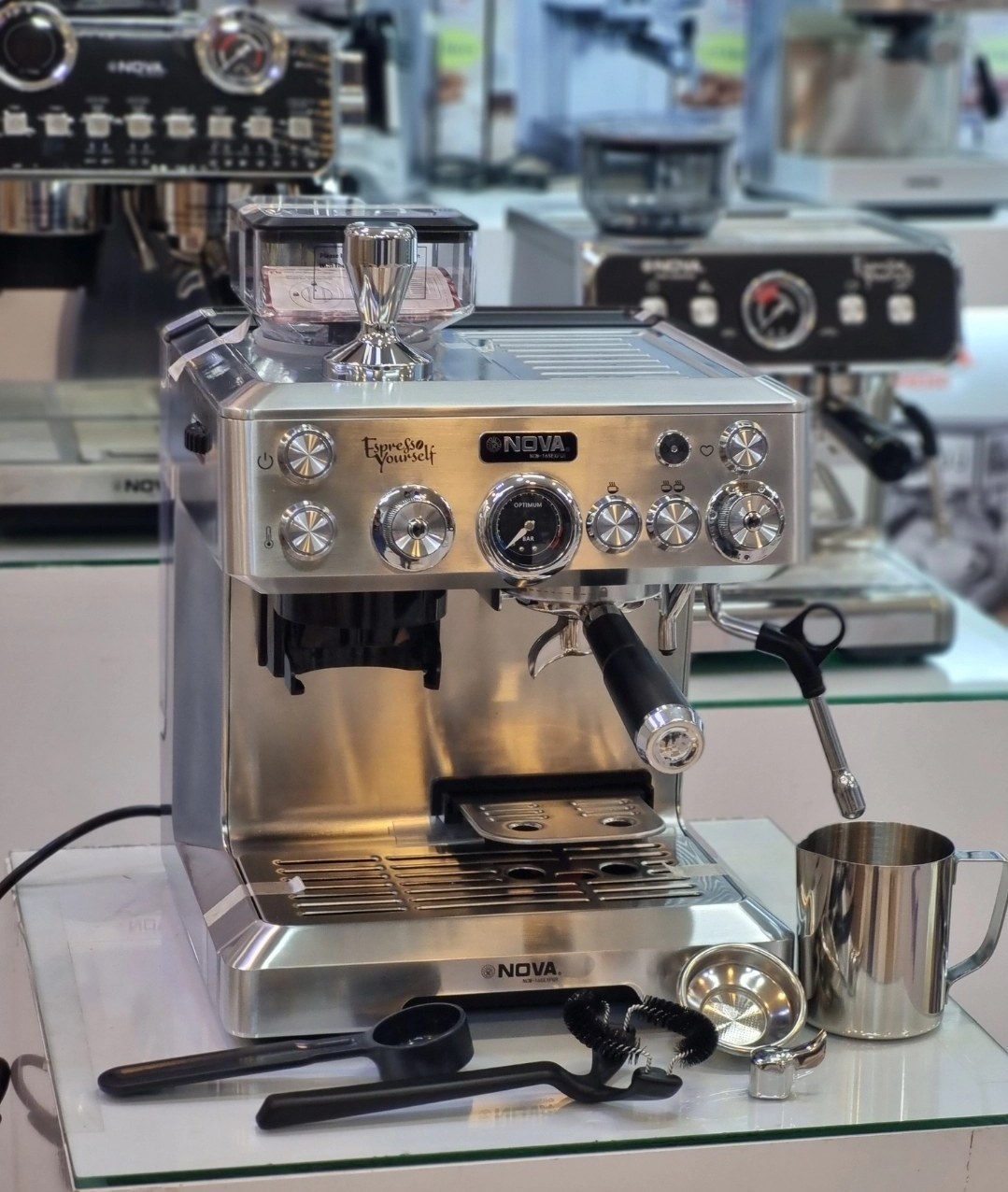 OjSRZNm-0rG4JwqD اسپرسو ساز نوا مدل NCM-165EXPGR ظرفیت ۲.۷ لیتر با فیلتر استیل - تصویر 1